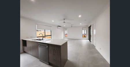 Your Band New 4 Bedroom Home Awaits ! - Photo 2