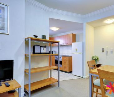 FURNISHED APARTMENT LOCATED IN THE CBD - Photo 3