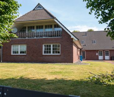 Großzügige Wohnung mit pflegeleichtem Garten - Photo 1