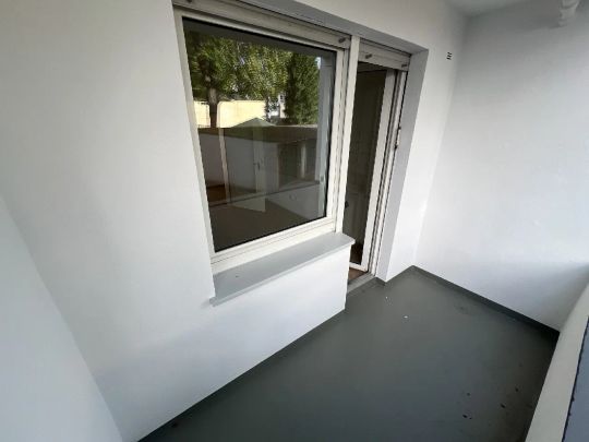 Helle 3-Zimmer-Erdgeschosswohnung mit Balkon in gepflegtem Mehrfamilienhaus - Photo 1