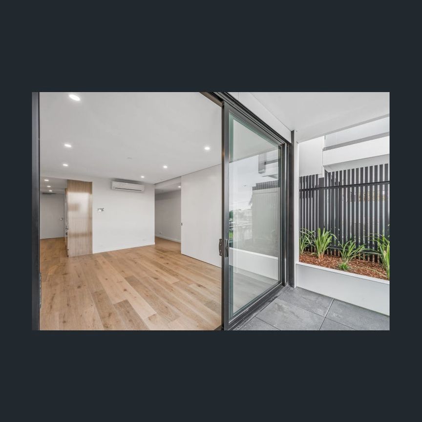 Ideally Located Modern One Bedroom Apartment - Photo 1