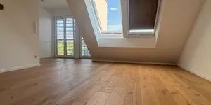 Lichtdurchflutete 2-Zimmer-Dachgeschosswohnung mit traumhaftem Grünblick im 13. Bezirk - Photo 3