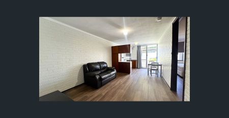 Step into easy living with this stylish, low maintenance furnished home! - Photo 4