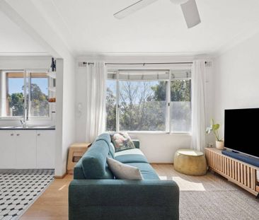 Leafy Top-Floor Haven with Dual Balconies and Modern Comfort - Photo 3