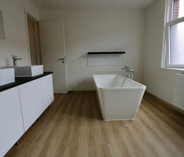 Gerenoveerde rijwoning met 2 slaapkamers en stadskoer. - Photo 6