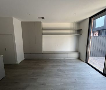 Stylish Near-New 3-Bedroom Townhome in the Heart of Bowden - Photo 1