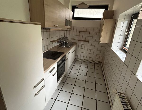 Charmante 2,5-Zimmer-Obergeschosswohnung mit moderner Einbauküche in Rehburg-Loccum - Photo 1