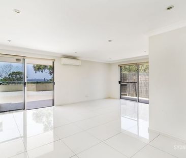 LIGHT FILLED, NORTH FACING APARTMENT | Unfurnished - Photo 3