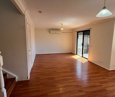 Neat & Tidy Townhouse in a Convenient Location - Photo 2