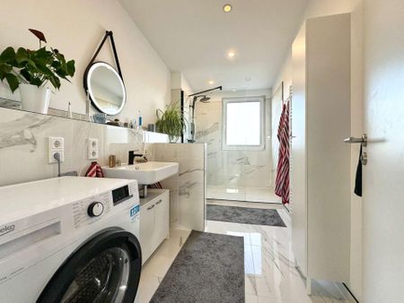 Sanierte 2-Zimmer-Neubauwohnung mit Südwest-Balkon und moderner Einbauküche - Photo 2