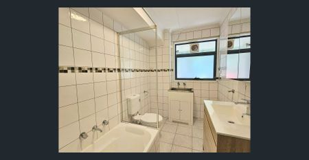 Spacious, Light-Filled Apartment in the Heart of Box Hill - Photo 2