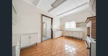 Convenient & Comfortable Living Opposite the Train Station! - Photo 3