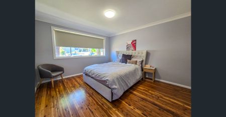 Spacious Family Home with Drive-Through Parking & Outdoor Entertaining - Photo 2