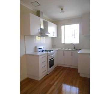 Updated One-Bedroom Villa Unit with Private Courtyard in Prime Cobu... - Photo 1