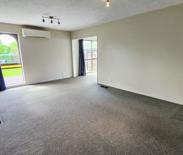 Spacious 3-Bedroom Home with Double Garage, Great Garden & Solar - Photo 1