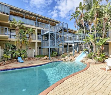 Coastal Living at Its Finest: Fully Furnished 2-Bedroom Ground Floo... - Photo 6