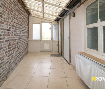 Verzorgde rijwoning met grote tuin! - Photo 1