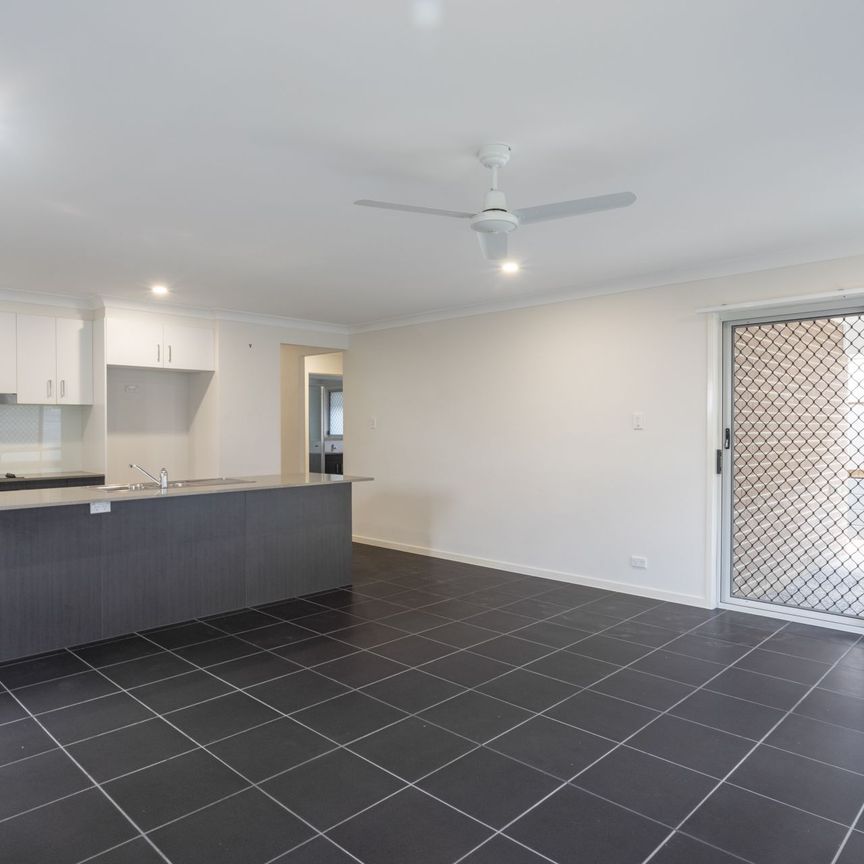 Beautiful family home in the thriving Providence Estate! - Photo 1