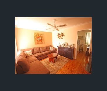 Well-Maintained Three-Bedroom Home - Photo 1