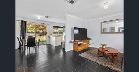 Three Bedroom Home in Glenfield Park with Updated Bathroom - Photo 2