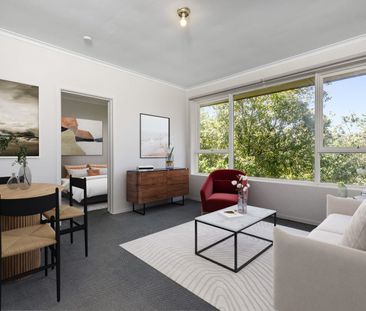 Stylish Two-Bedroom Gem with Secure Parking in a Winning Location! - Photo 5