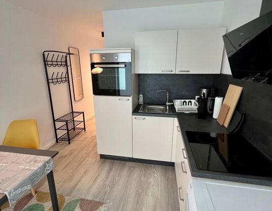 Exklusives Apartment mit Terrasse in zental gelegenem Neubau - Foto 1