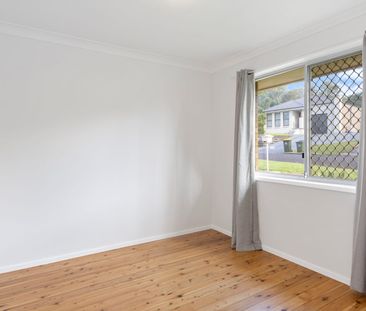 Freshly Updated Family Home with Sunroom & Covered Deck - Photo 1