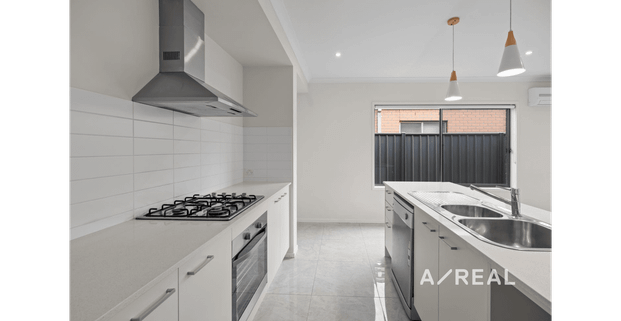 Modern Family Living in Craigieburn’s Most Desirable Pocket - Photo 1