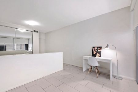Furnished Split-Level Apartment with Study I Ducted A/C & Balcony in Prime Inner-City Spot - Photo 5