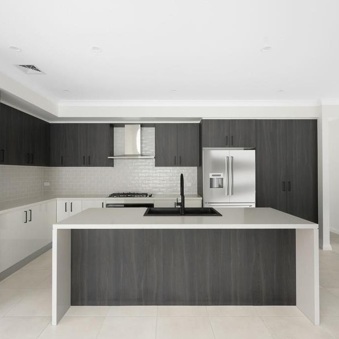 BRAND NEW 4-BEDROOM FAMILY HOME – QUIET STREET LOCATION - Photo 1