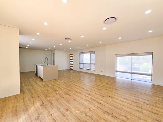 Stylish Family Living in a Peaceful Location - Photo 1