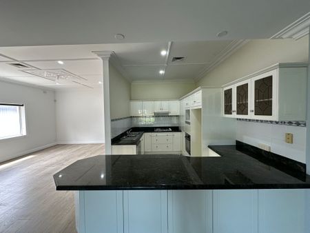 Spacious Family Residence in Highly Sought after Suburb - Photo 3