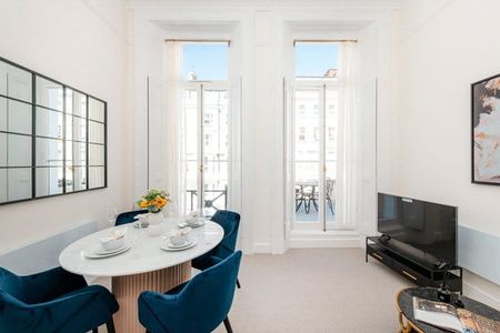 A well-presented first floor (with lift) two bedroom, two bathroom flat that benefits from its own private balcony, located on the west side of Lexham Gardens. Tenancy Length: Minimum 12 months EPC Rating C | Council Tax Band F - Photo 3