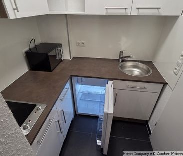 Zentrum: 1-Zi.-App. mit Einbauküche in ruhiger Lage, mit Hofbenutzung - Photo 2