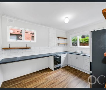 Open the Door to a Private Courtyard Retreat with Northern Light - Photo 6