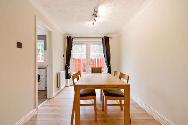 A modern three bedroom home with garage and off-street parking in a cul-de-sac location. - Photo 1