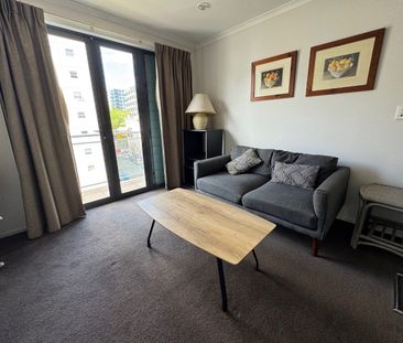 Cozy 1-Bedroom Studio with Covered Garage parking - Photo 1