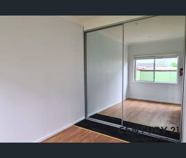 Spacious 4-Bedroom Family Home in a Great Location! - Photo 2