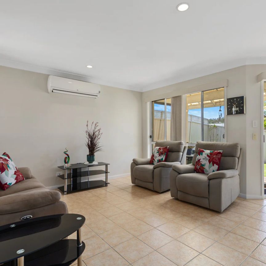 Immaculate Low-Set Home in a Quiet, Convenient Arundel Location - Photo 1