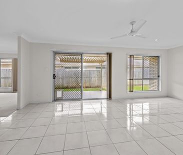 Stylish Low-Set Family Home Backing Onto Bushland | Peaceful Griffi... - Photo 6