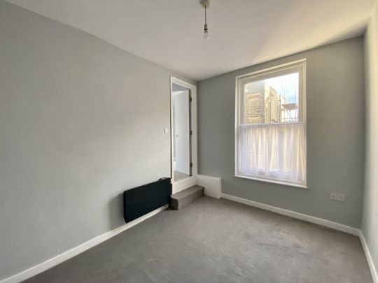 Updated 1st Floor Flat with Glimpses of the Sea! - Photo 1