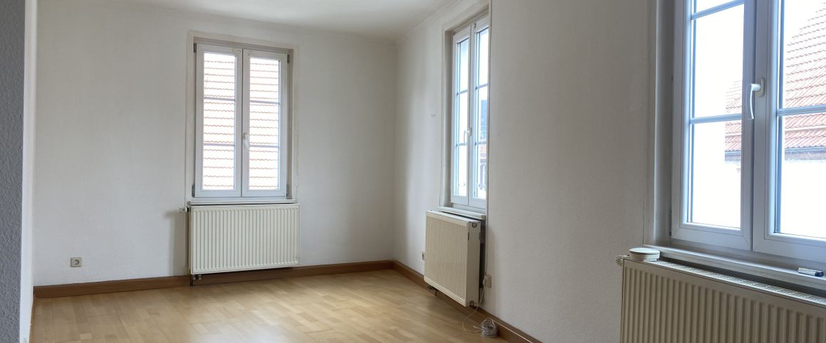 Helle 2 Zimmer-Wohnung im 1. Obergeschoss - Foto 1