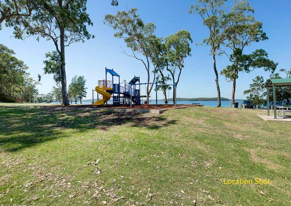 UNIQUE GARDEN OASIS - 3 BEDROOM HOME WITH STUDIO & LAKE VIEWS - Photo 1