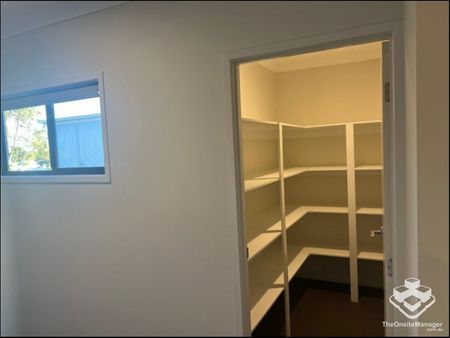 Beautiful 4-Bedroom Family Home in the Heart of Coomera - Photo 3