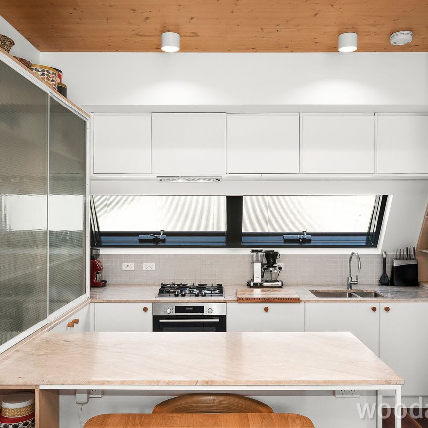 Stunning 4-Level Townhouse in Near-New Brunswick Complex - Photo 1