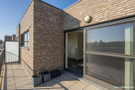 INSTAPKLAAR APPARTEMENT MET 2 SLAAPKAMERS, TERRAS EN AUTOSTAANPLAATS GELEGEN NABIJ HET CENTRUM VAN BILZEN - Photo 3