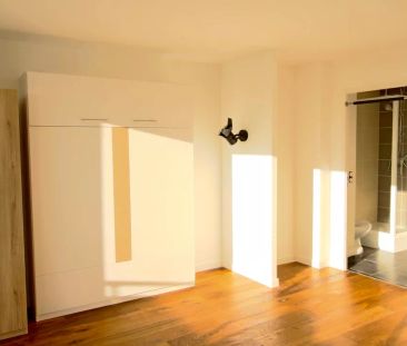 Appartement T1 avec terrasse loué Meublé avec cave et parking - Photo 1