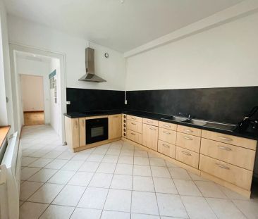 A LOUER APPARTEMENT EN RDC PROCHE CENTRE VILLE DE ST QUENTIN 02100 - Photo 2