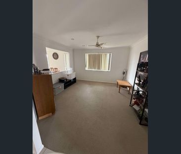 Modern Coastal Living in Beautiful Bargara - Spacious 4-Bedroom Fam... - Photo 4