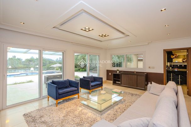 Casa em Condomínio com 4 quartos e 445m² para alugar em Cavalhada, Porto Alegre. - Photo 1